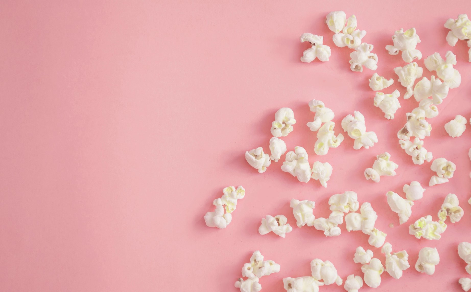 Popcorn on pink background